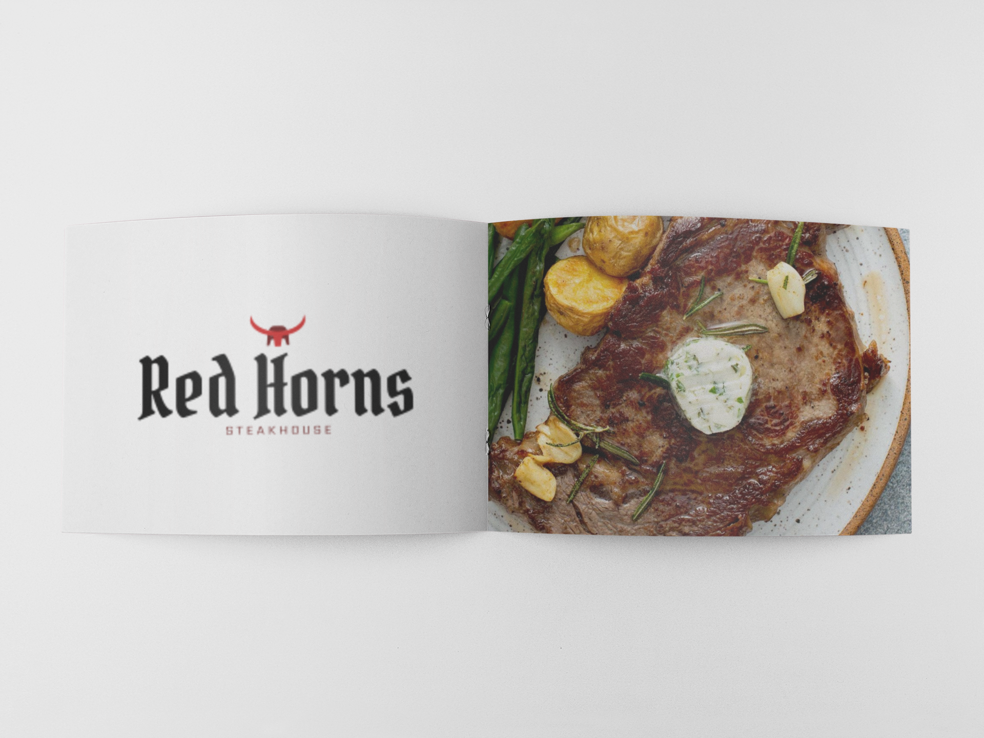 An example of an open saddlestitch, stapled booklet.